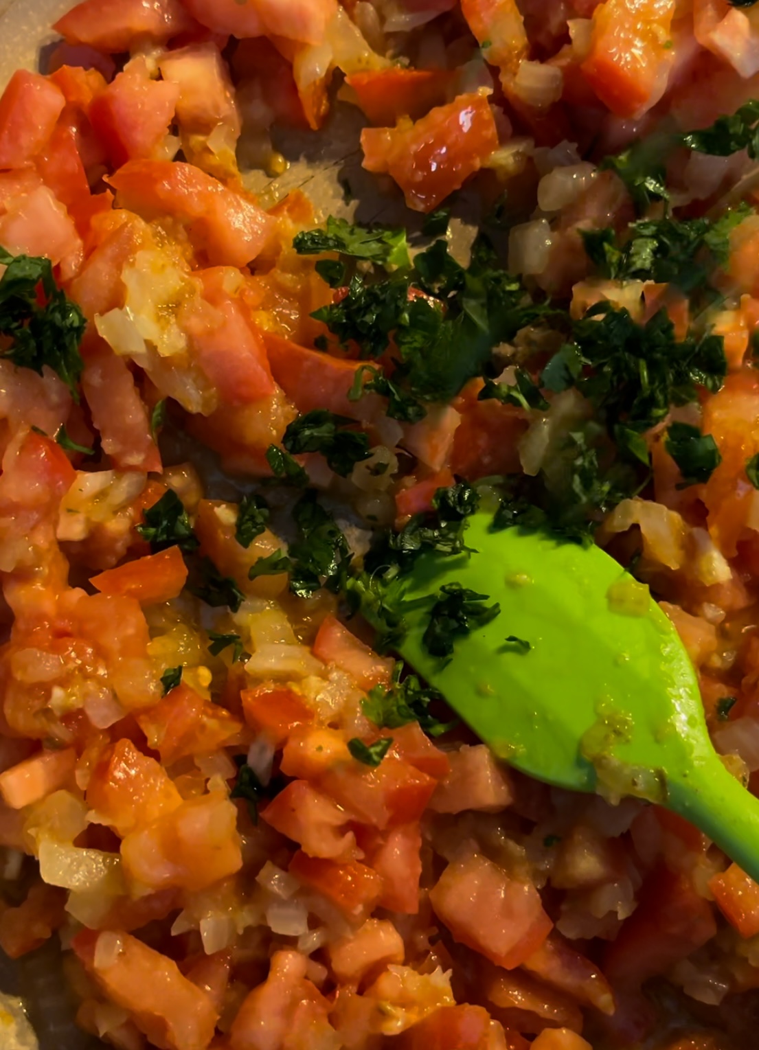 Tomatoes and onions along with freshly chopped herbs